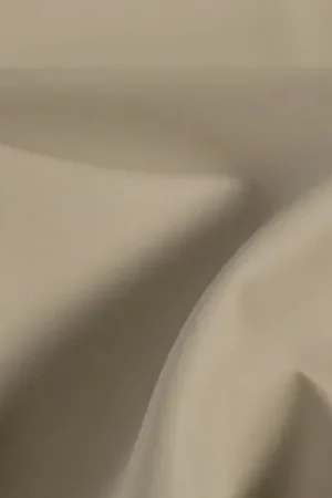 Waterdichte stof , uni , taupe/zand . X1195 Gereduceerde Prijs